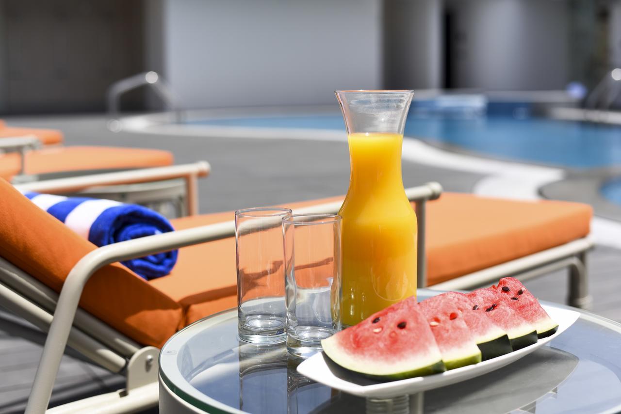Fraser Suites Μουσκάτ Εξωτερικό φωτογραφία A bottle of orange juice
